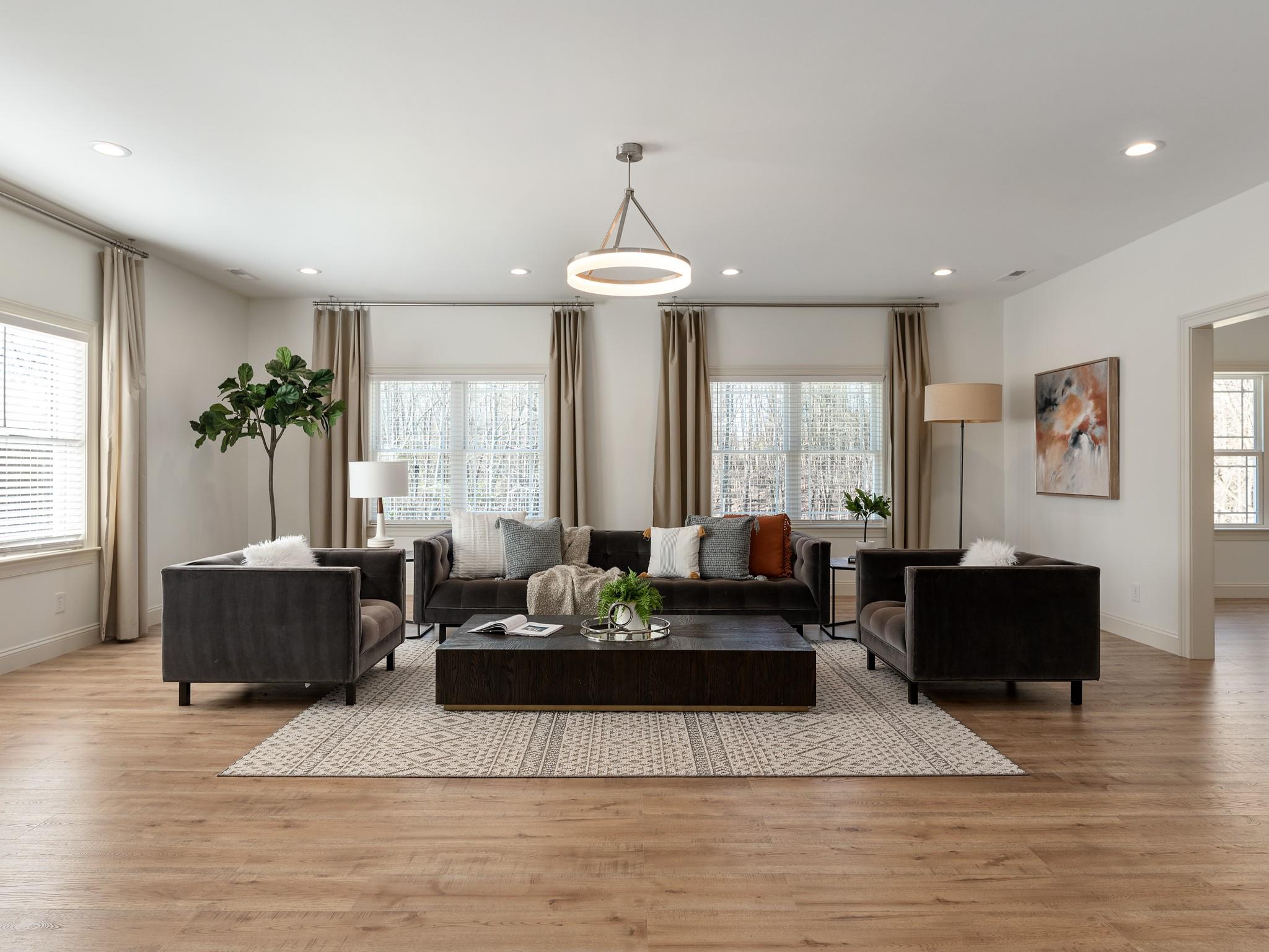 7417 New Town Road Waxhaw, NC 28173 - Photo 13 of 41 a living room with furniture and a large window