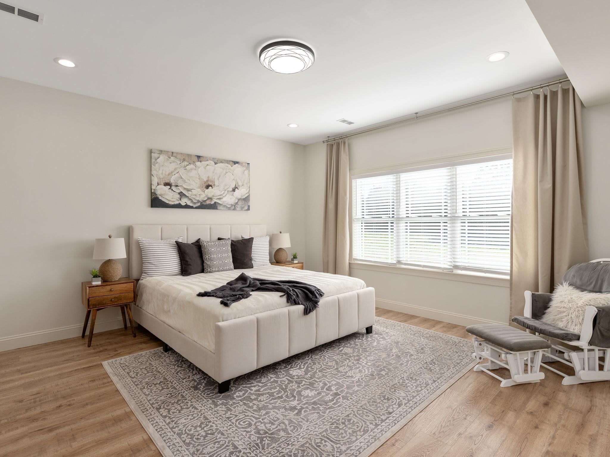 7417 New Town Road Waxhaw, NC 28173 - Photo 22 of 41 a living room with furniture and a large window