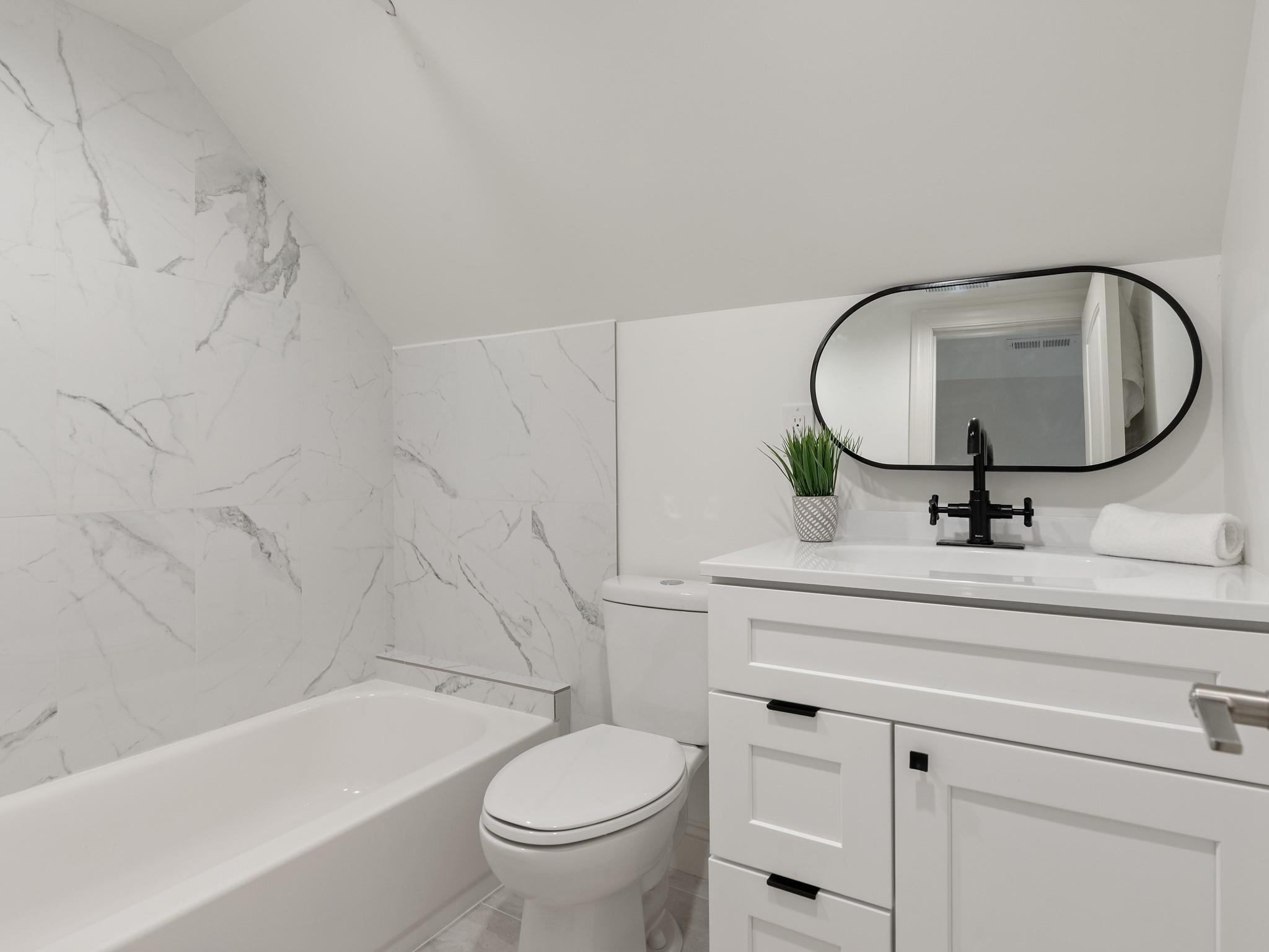 7417 New Town Road Waxhaw, NC 28173 - Photo 29 of 41 a bathroom with a sink and a mirror