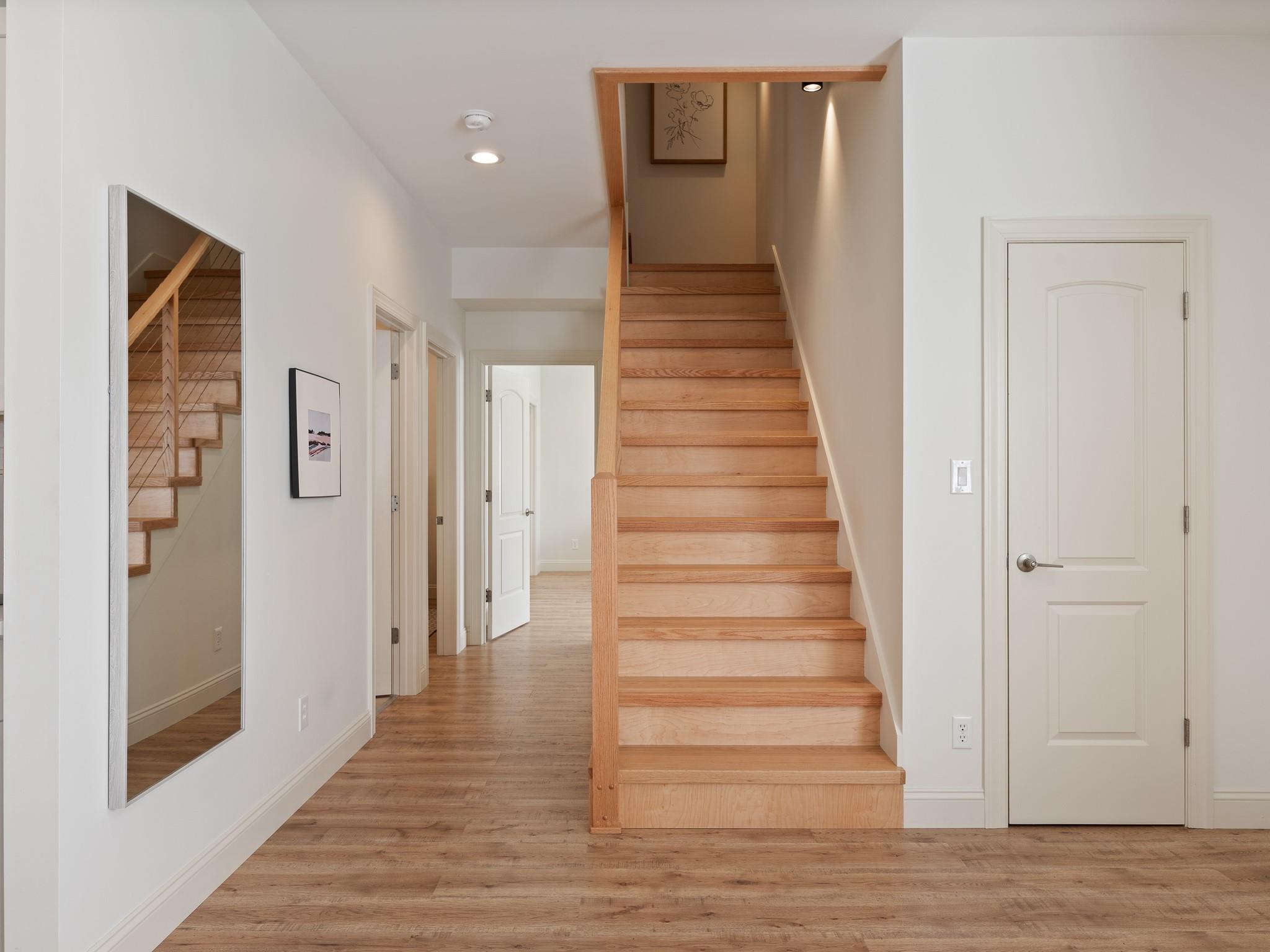 7417 New Town Road Waxhaw, NC 28173 - Photo 6 of 41 a view of a hallway with wooden floor and entryway