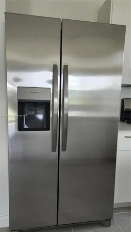 a close view of a refrigerator in kitchen