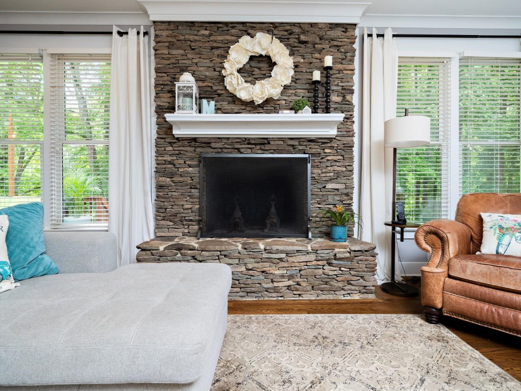 2516 Mt Vernon Church Road Raleigh, NC 27614 - Photo 11 of 58 a living room with furniture and a fireplace