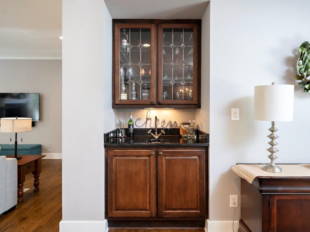 2516 Mt Vernon Church Road Raleigh, NC 27614 - Photo 15 of 58 a kitchen with granite countertop a stove and a sink