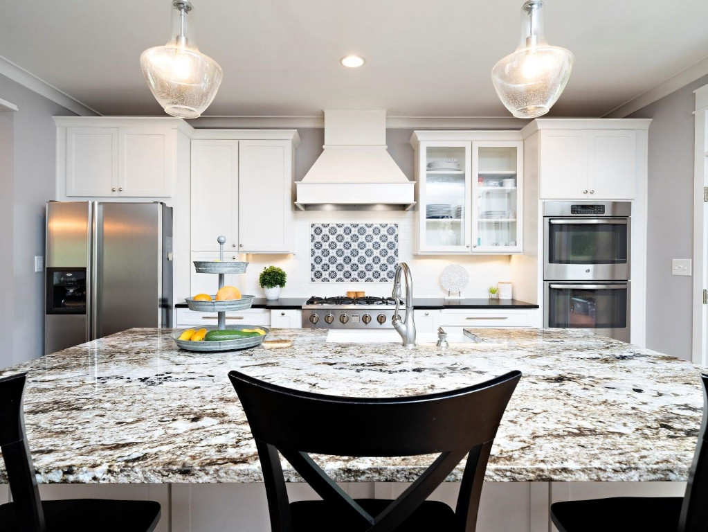 2516 Mt Vernon Church Road Raleigh, NC 27614 - Photo 20 of 58 a kitchen with stainless steel appliances kitchen island granite countertop a sink and cabinets