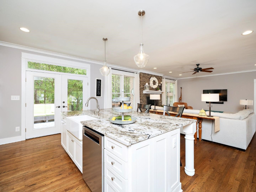 2516 Mt Vernon Church Road Raleigh, NC 27614 - Photo 21 of 58 a kitchen with sink stove and wooden floor