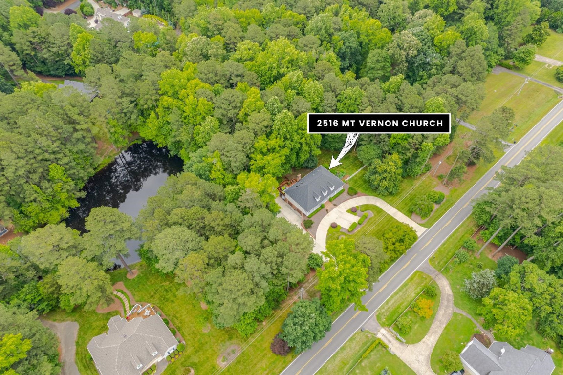 2516 Mt Vernon Church Road Raleigh, NC 27614 - Photo 3 of 58 a sign that is sitting on a wall