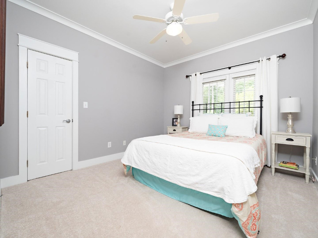 2516 Mt Vernon Church Road Raleigh, NC 27614 - Photo 40 of 58 a spacious bedroom with a bed and a window