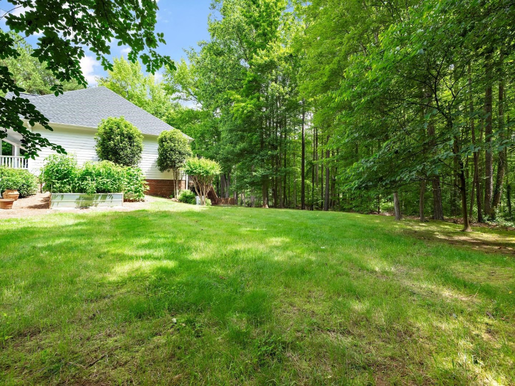 2516 Mt Vernon Church Road Raleigh, NC 27614 - Photo 45 of 58 a view of a house with a big yard