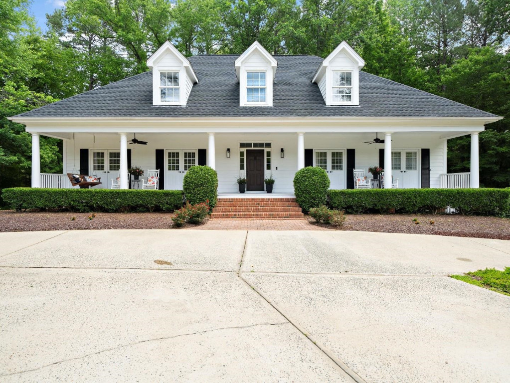 2516 Mt Vernon Church Road Raleigh, NC 27614 - Photo 6 of 58 a front view of a house with garden