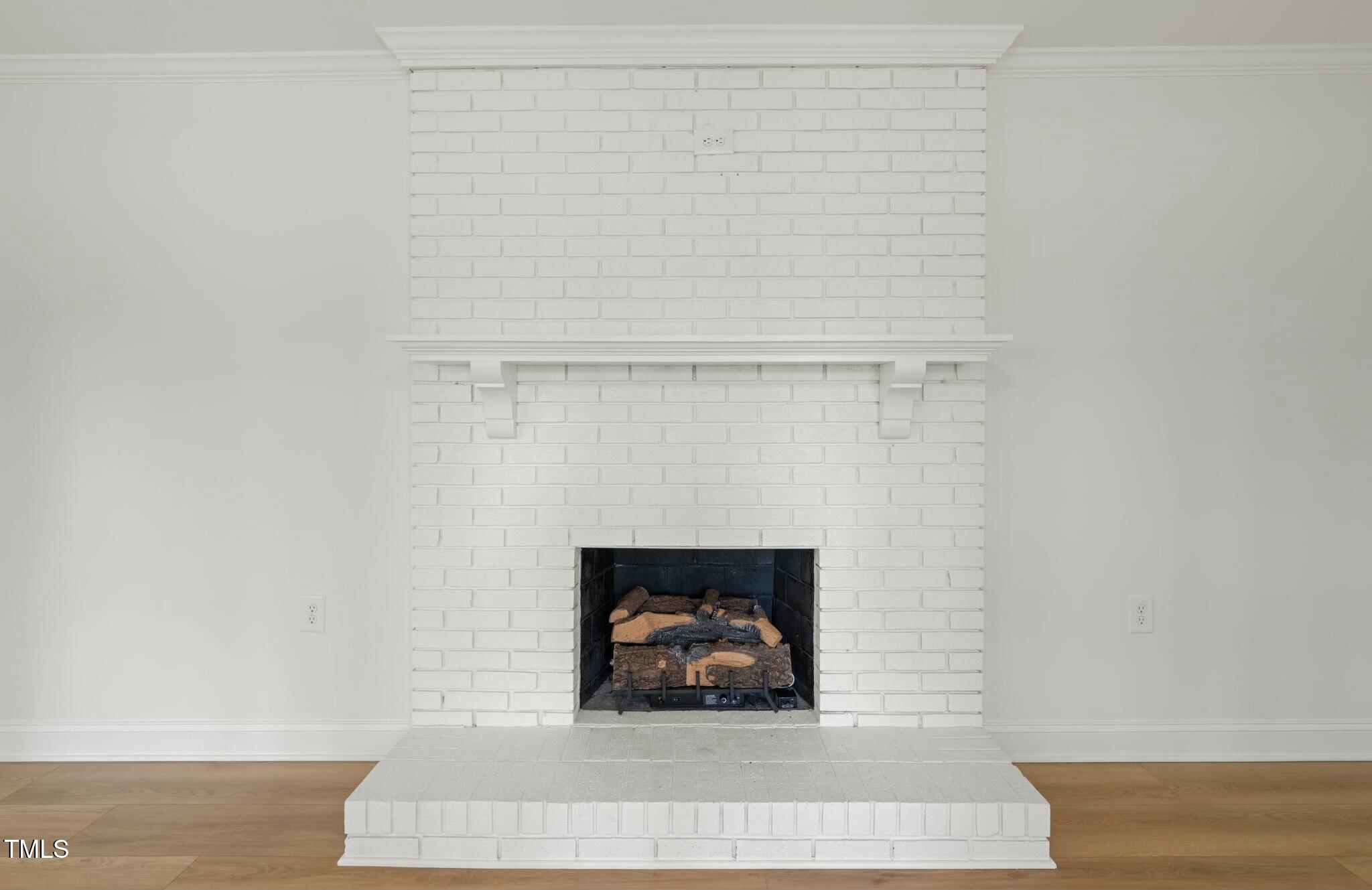 8917 Fowler Road Zebulon, NC 27597 - Photo 26 of 33 a room with a fireplace