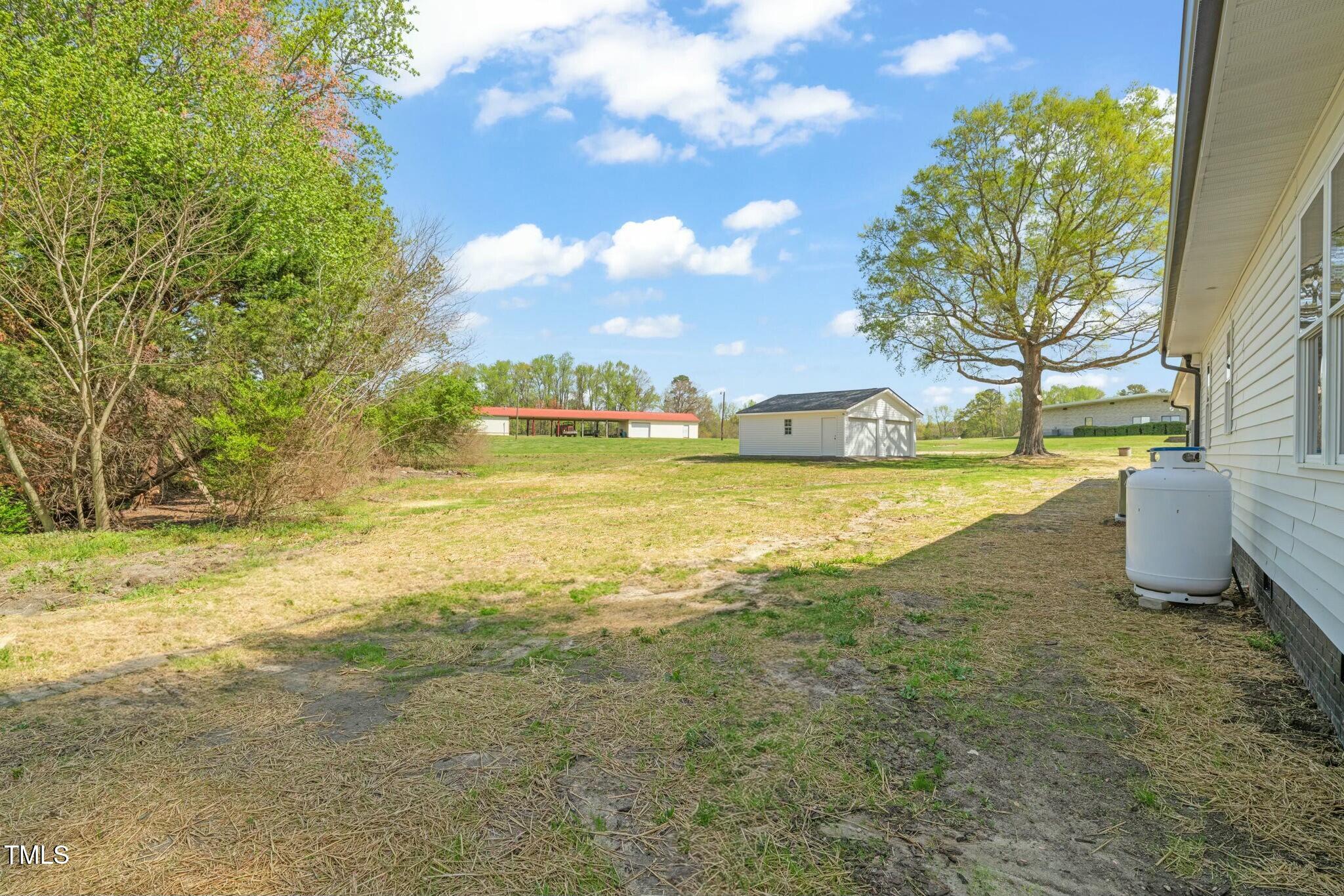 8917 Fowler Road Zebulon, NC 27597 - Photo 30 of 33 a view of an ocean and beach