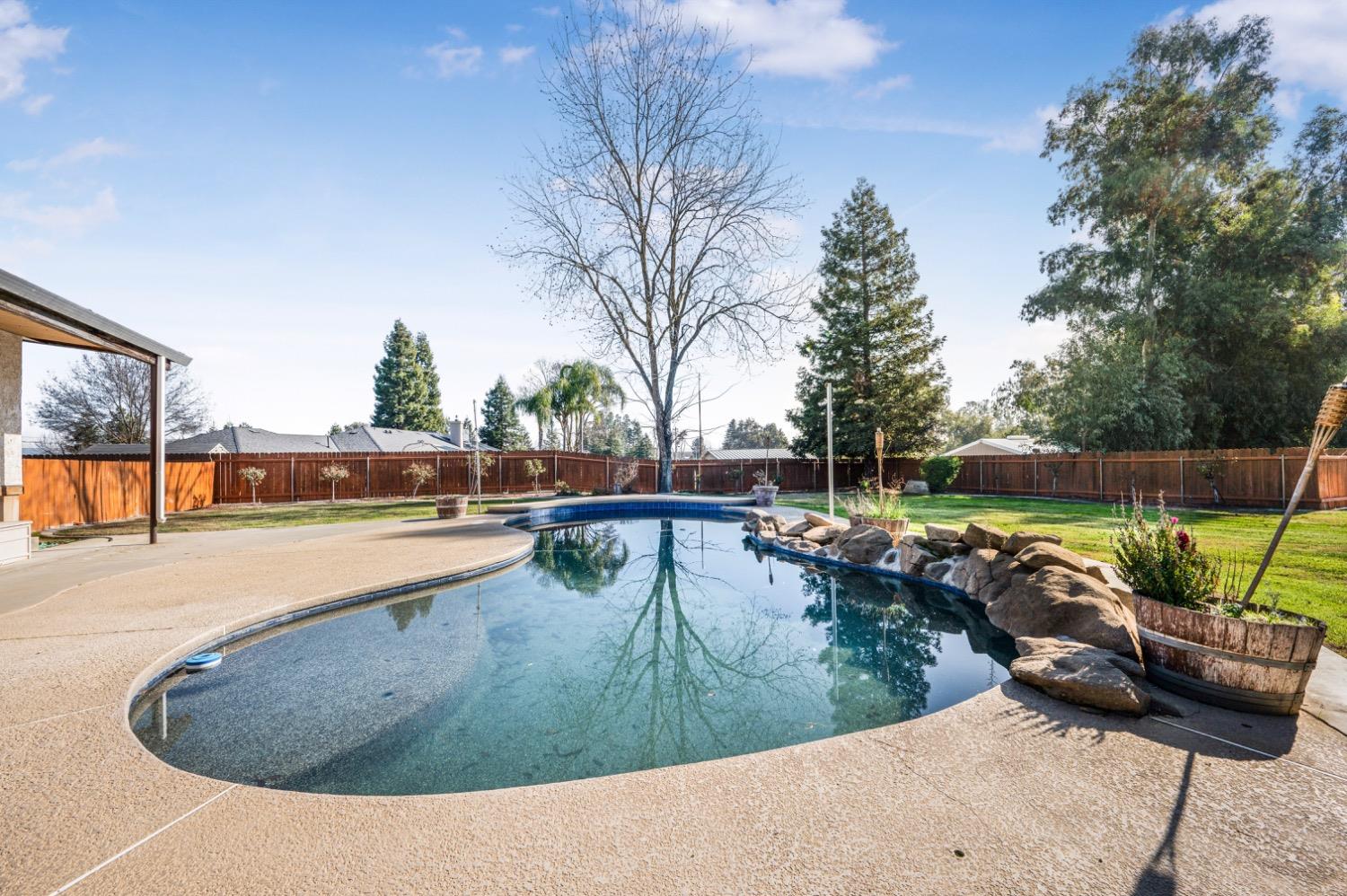 31334 Donald Avenue Madera, CA 93636 - Photo 29 of 38 a view of swimming pool with a lounge chair