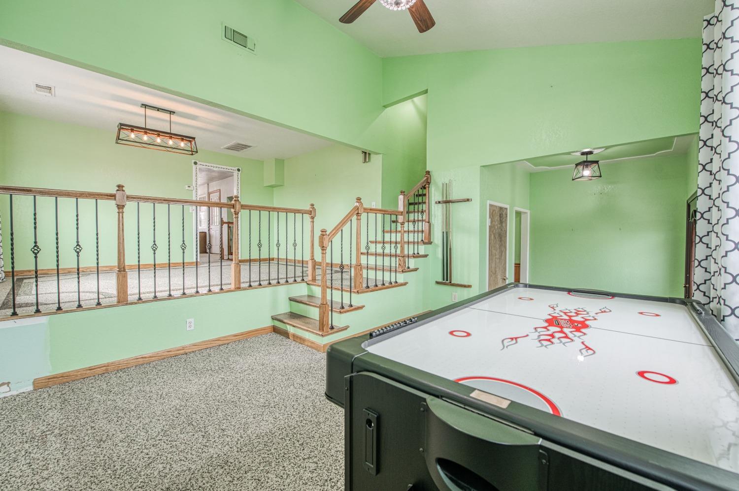 31334 Donald Avenue Madera, CA 93636 - Photo 4 of 38 a room with a bed and a large window