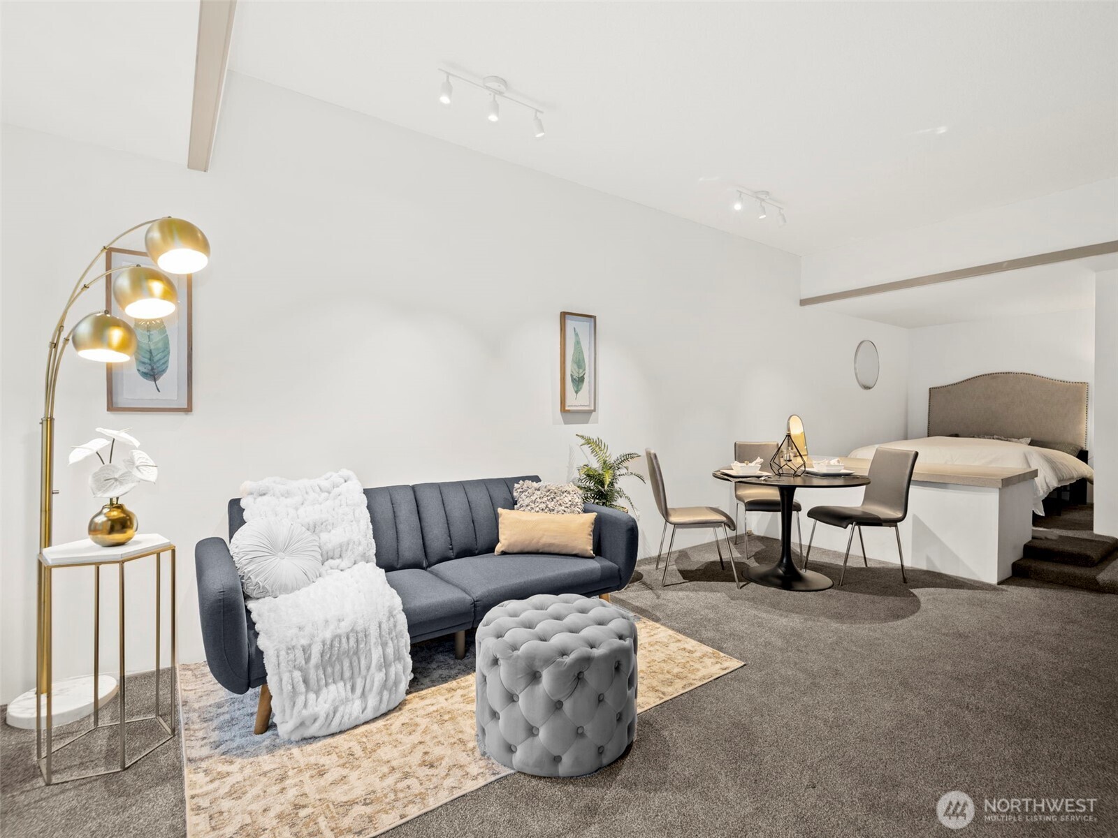 98 Union Street, Unit 610 Seattle, WA 98101 - Photo 18 of 33 a living room with furniture and window
