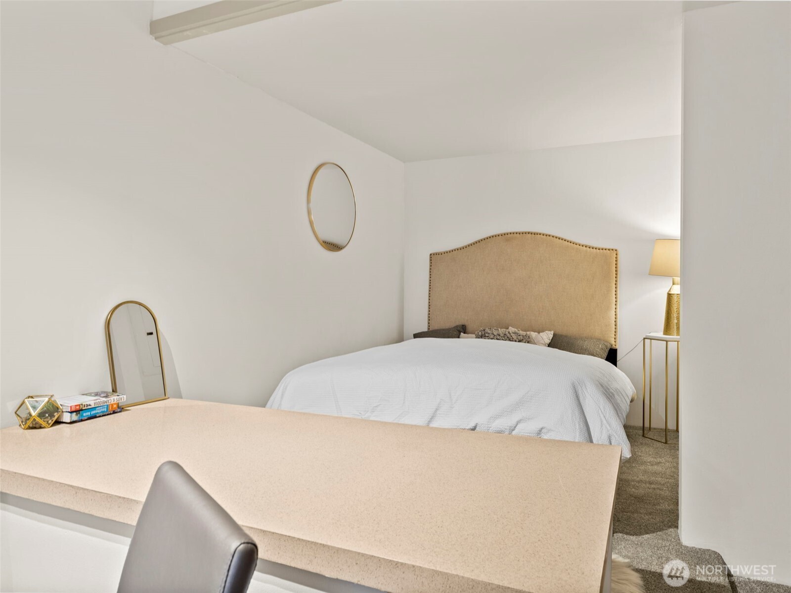 98 Union Street, Unit 610 Seattle, WA 98101 - Photo 25 of 33 a bedroom with bed and a window