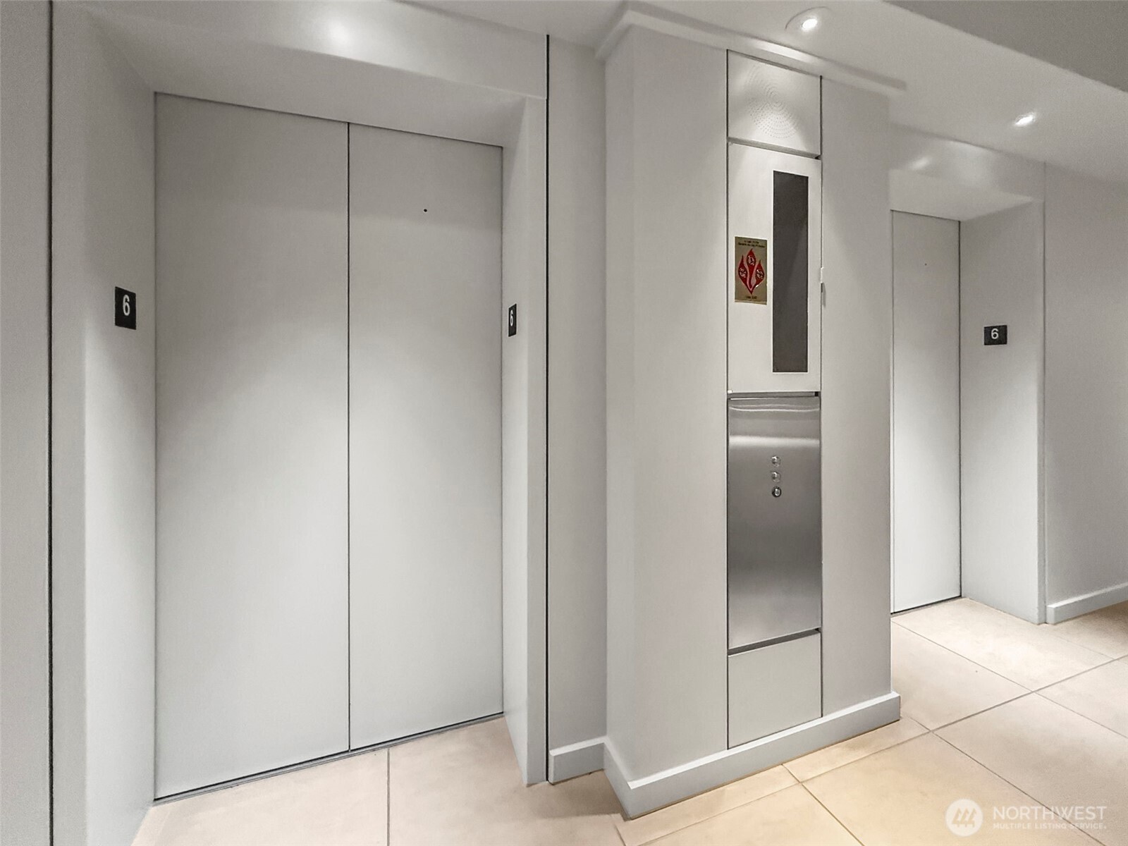 98 Union Street, Unit 610 Seattle, WA 98101 - Photo 4 of 33 a bathroom with a shower and closet