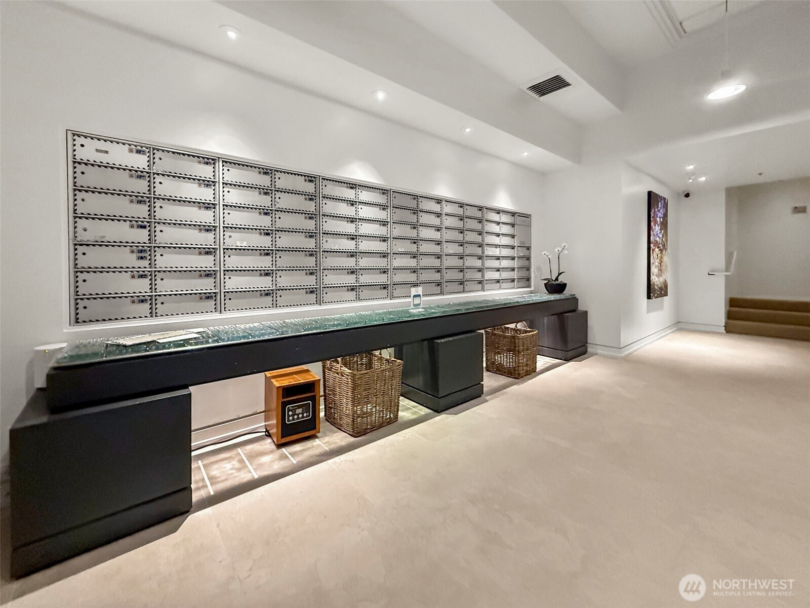 98 Union Street, Unit 610 Seattle, WA 98101 - Photo 6 of 33 a kitchen with stainless steel appliances granite countertop a stove and a sink