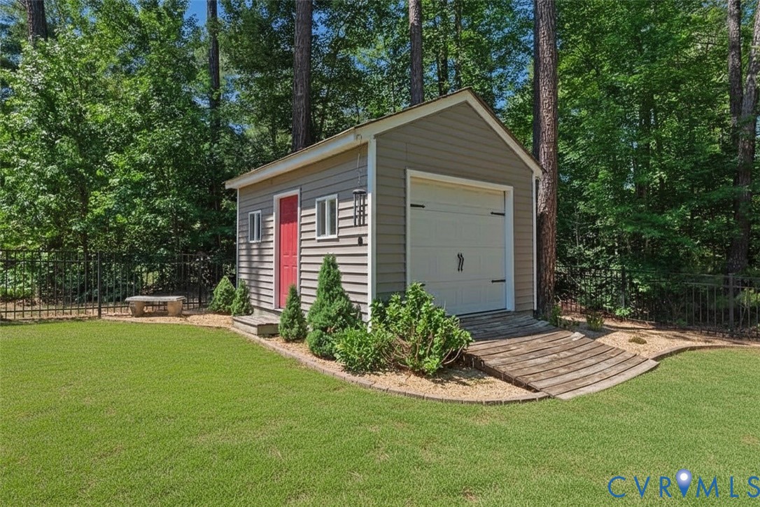 6446 Chestnut Church Road Mechanicsville, VA 23116 - Photo 42 of 49 Detached shed perfect for the lawn mower featuring
