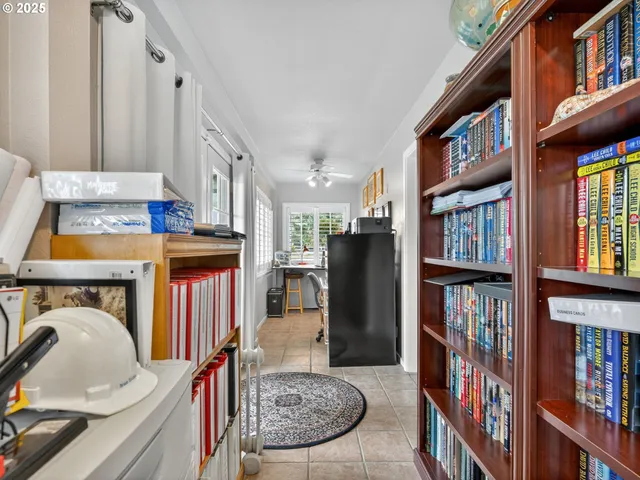 a view of living room kitchen and entryway