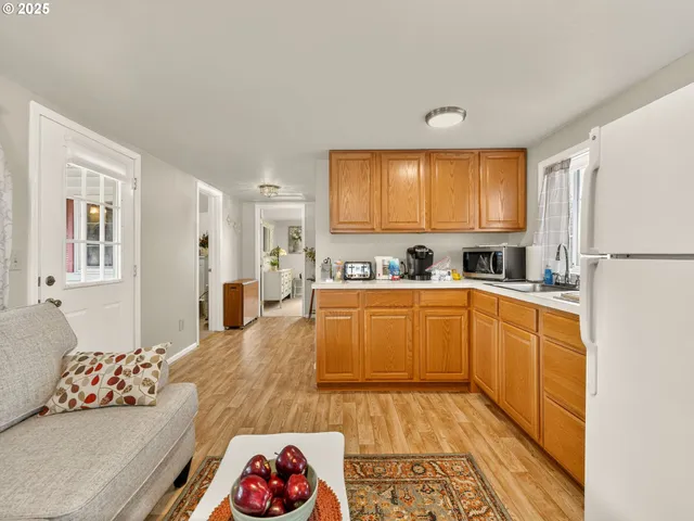 a bedroom with a bed and a table