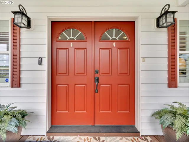 a front view of a house with garden