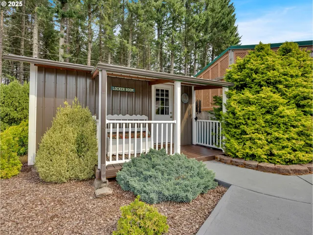 swimming pool view with a seating space