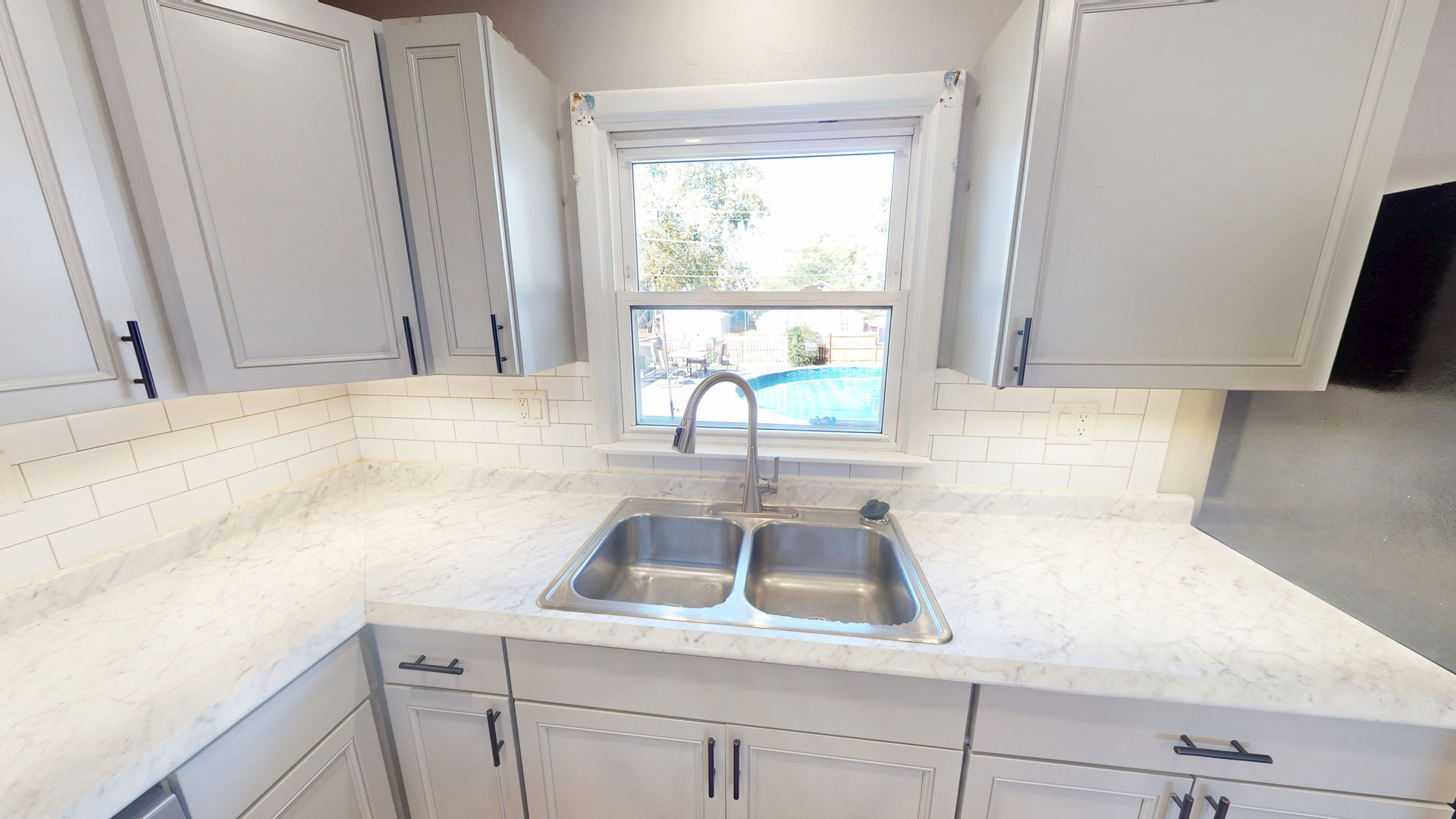 102 West Douglas Street St. Joseph, IL 61873 - Photo 17 of 27 a close view of sink and tap