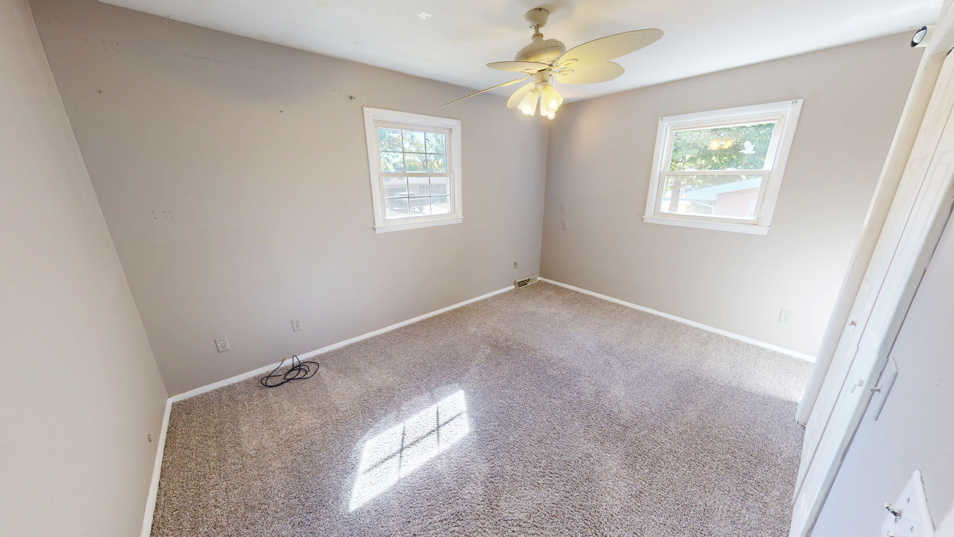 102 West Douglas Street St. Joseph, IL 61873 - Photo 19 of 27 a view of room with window and ceiling fan