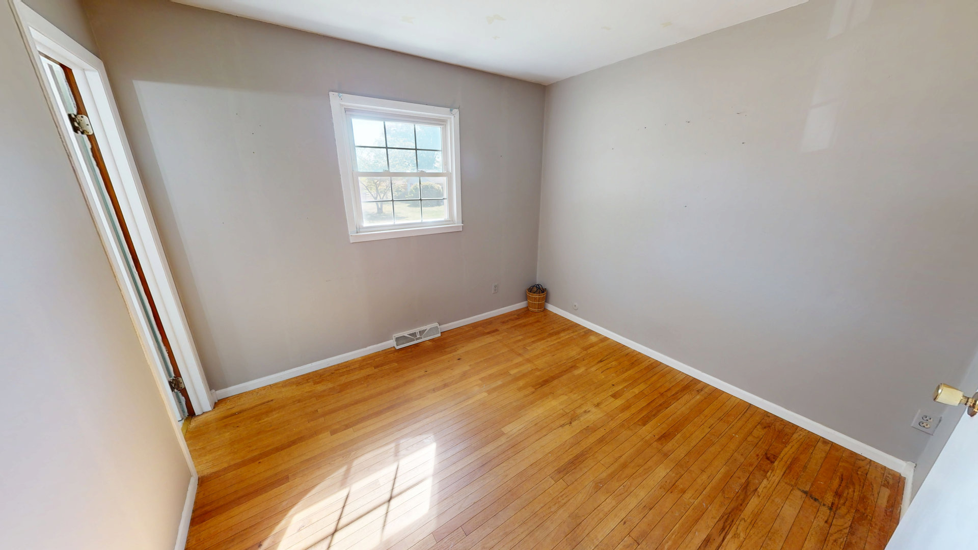 102 West Douglas Street St. Joseph, IL 61873 - Photo 23 of 27 a view of empty room with wooden floor