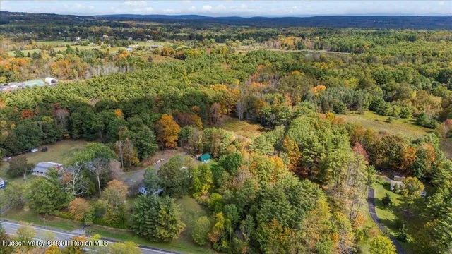 a view of a field with an outdoor space