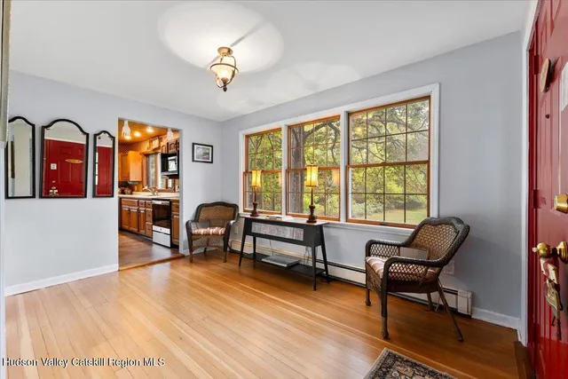 a living room with furniture and a window