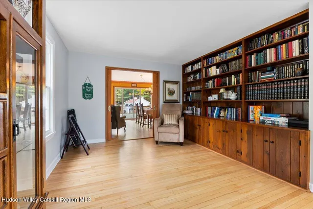 a view of a workspace with furniture and staircase