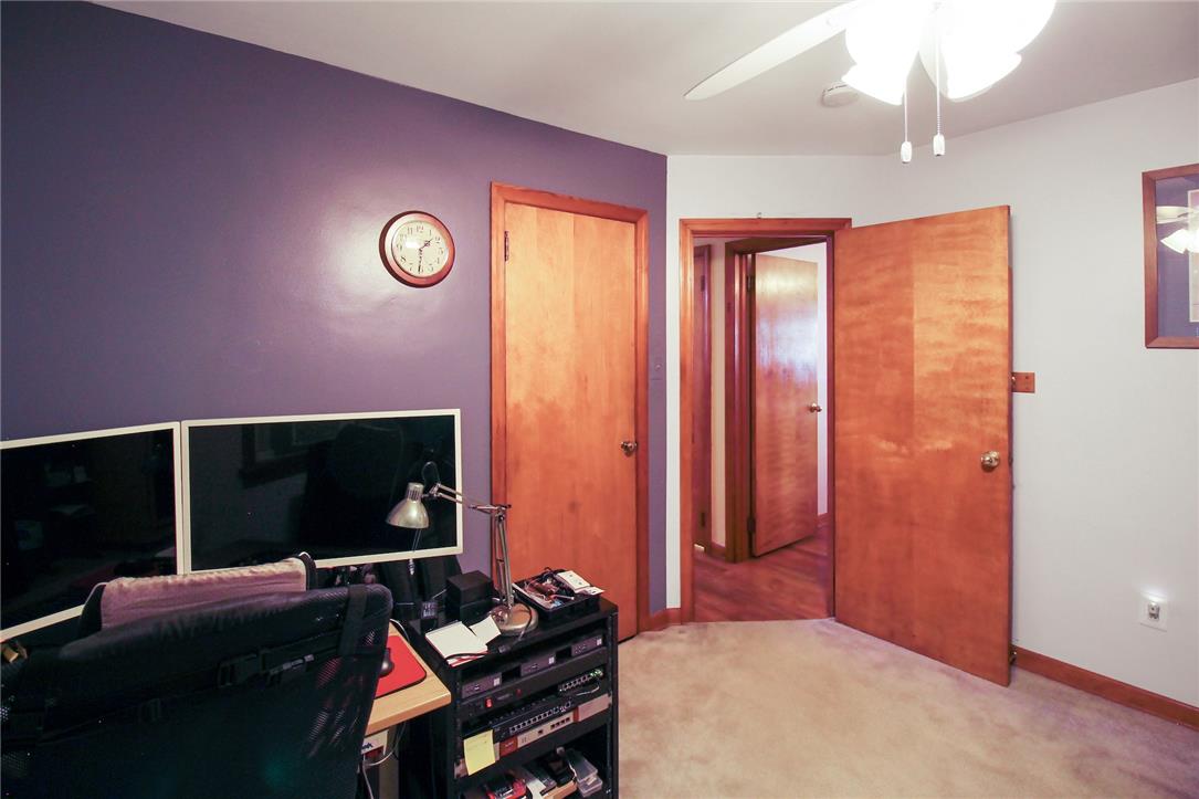 1256 Ridge Avenue Whitehall, PA 18052 - Photo 27 of 43 A versatile space features soft carpeting, wood doors, and a ceiling fan for comfort.
