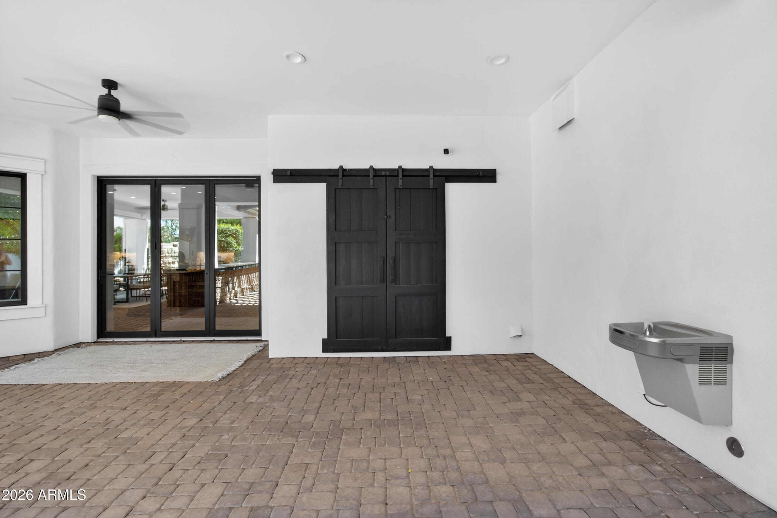 2677 East Queen Creek Road Gilbert, AZ 85297 - Photo 108 of 128 a view of an empty room with glass door