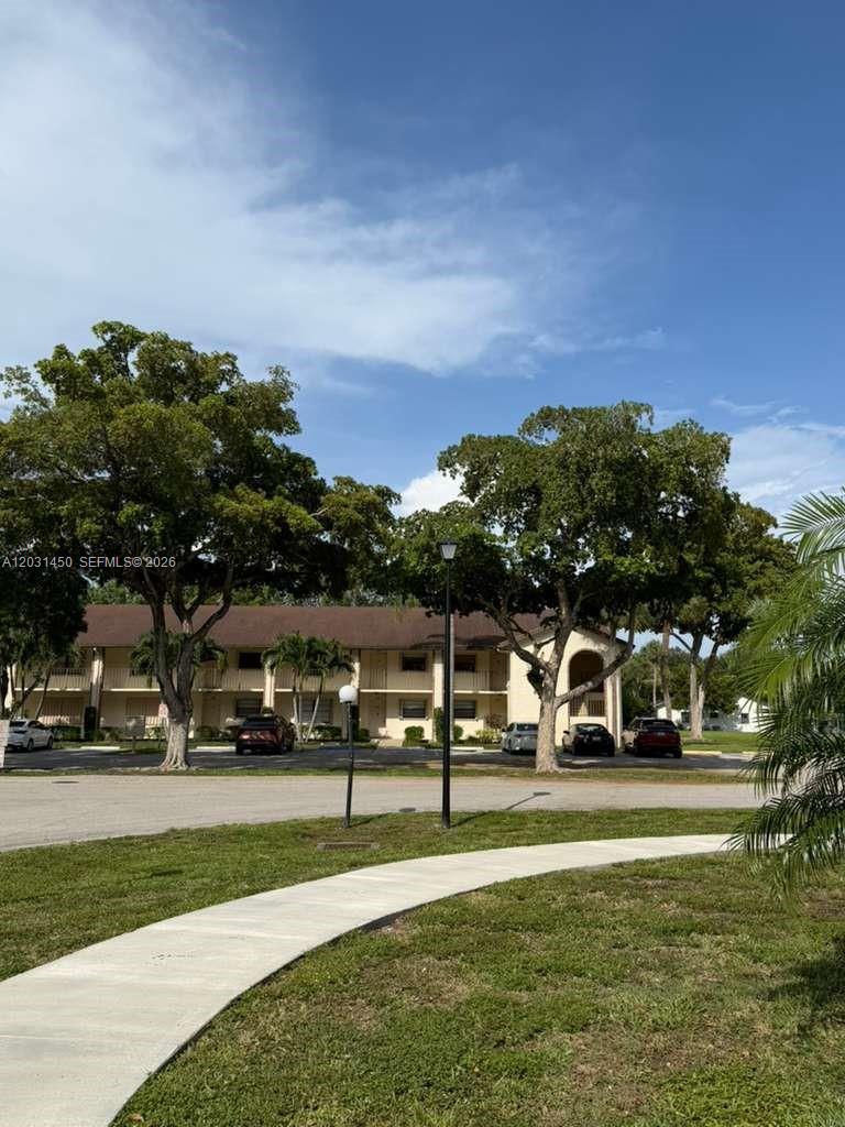23398 Lyons Road, Unit 309 Boca Raton, FL 33428 - Photo 5 of 16 a view of green field