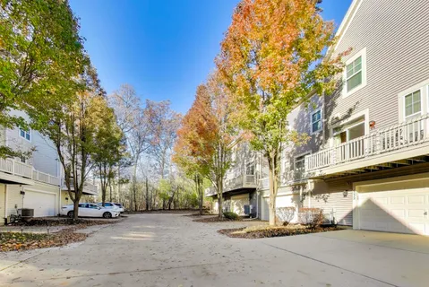 a view of a street with houses