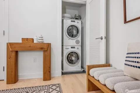 a kitchen with a stove and a refrigerator