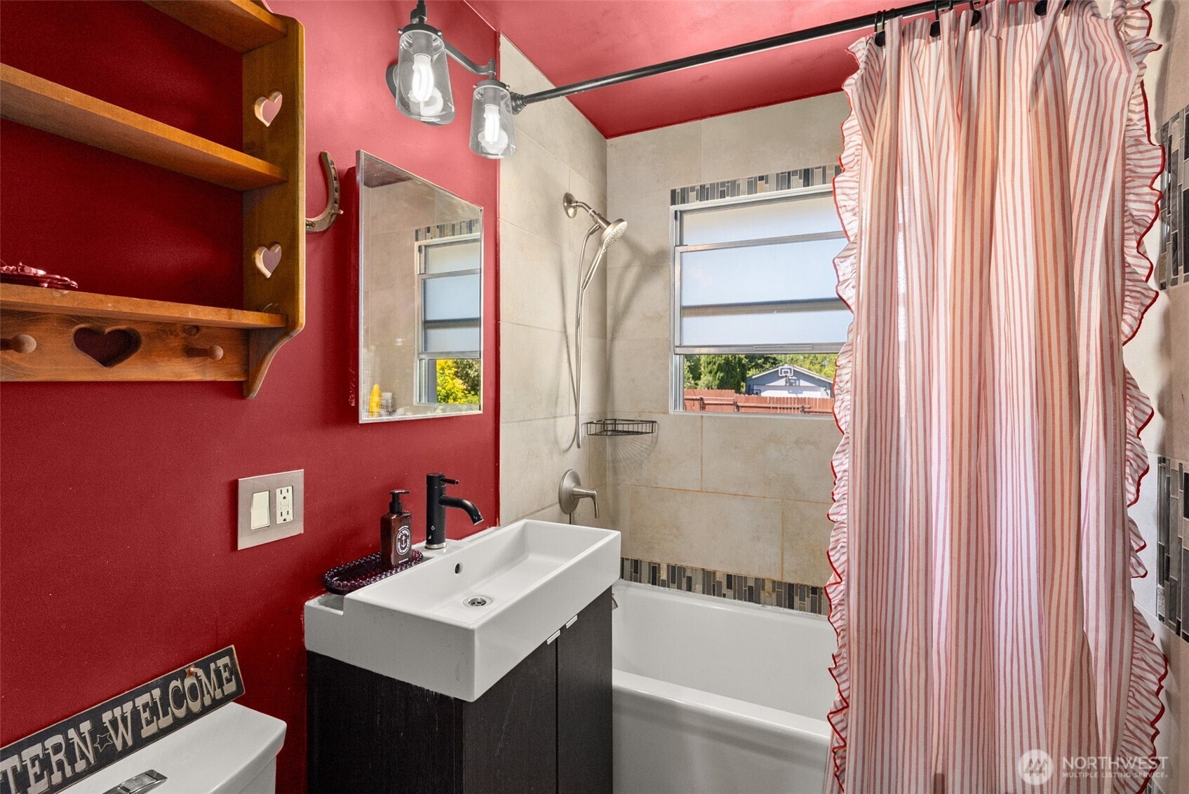 2710 Holman Street Bremerton, WA 98310 - Photo 14 of 25 a bathroom with a sink vanity granite tub and shower