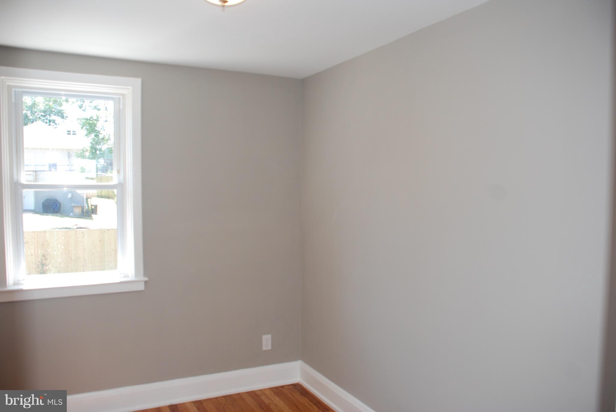 139 West Meadow Road Baltimore, MD 21225 - Photo 7 of 11 a view of an empty room with a window
