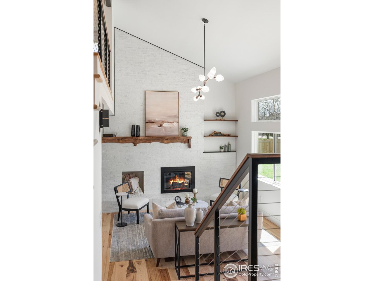 4223 Peach Way Boulder, CO 80301 - Photo 17 of 40 a view of a dining room with furniture and a chandelier