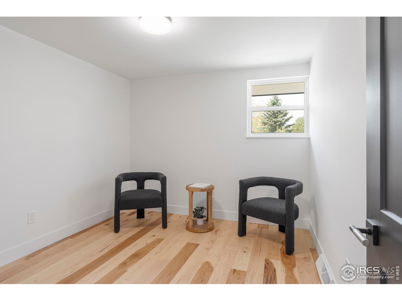 4223 Peach Way Boulder, CO 80301 - Photo 30 of 40 a picture of a bench in a room