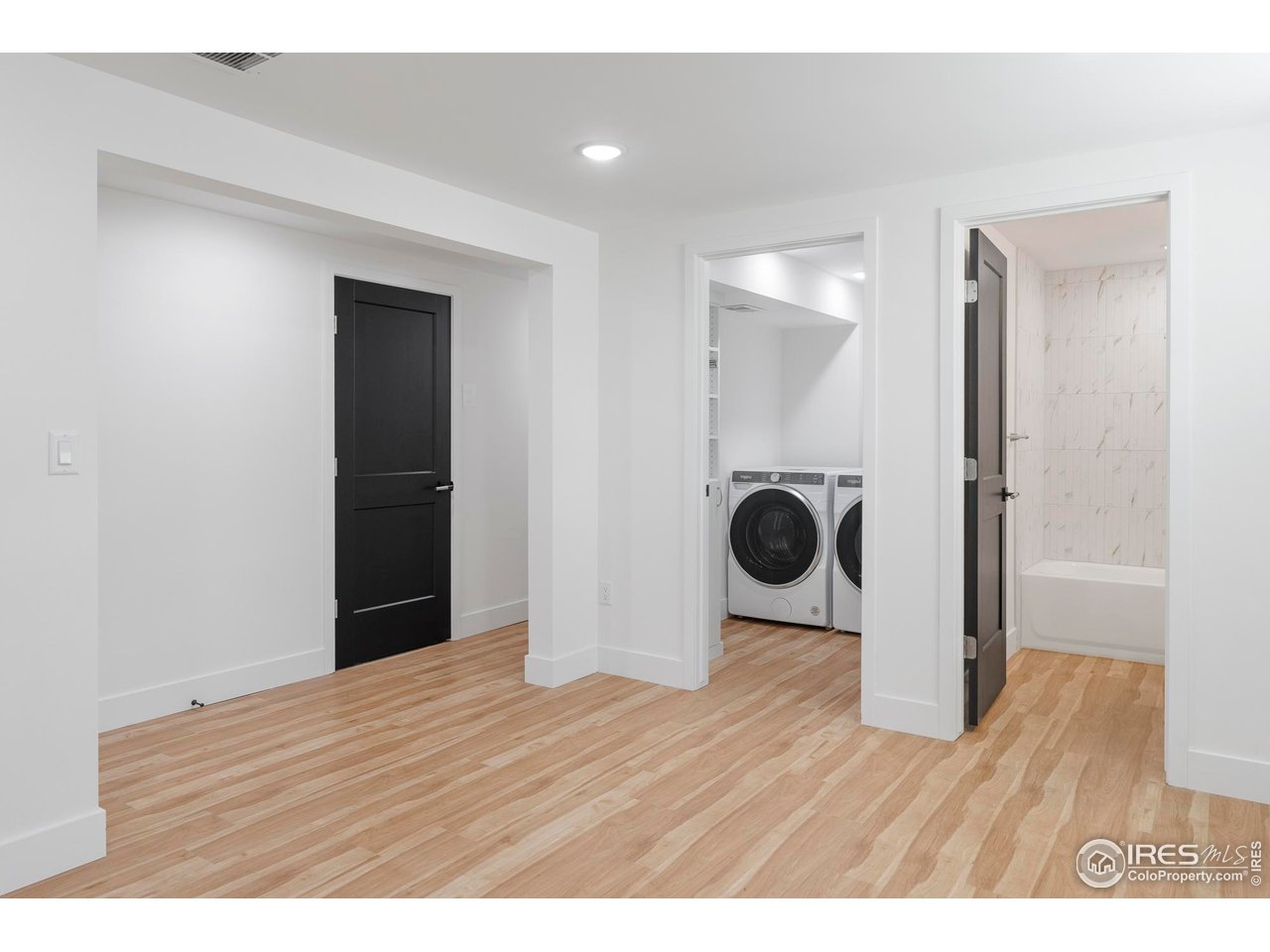 4223 Peach Way Boulder, CO 80301 - Photo 37 of 40 a view of an empty room and wooden floor