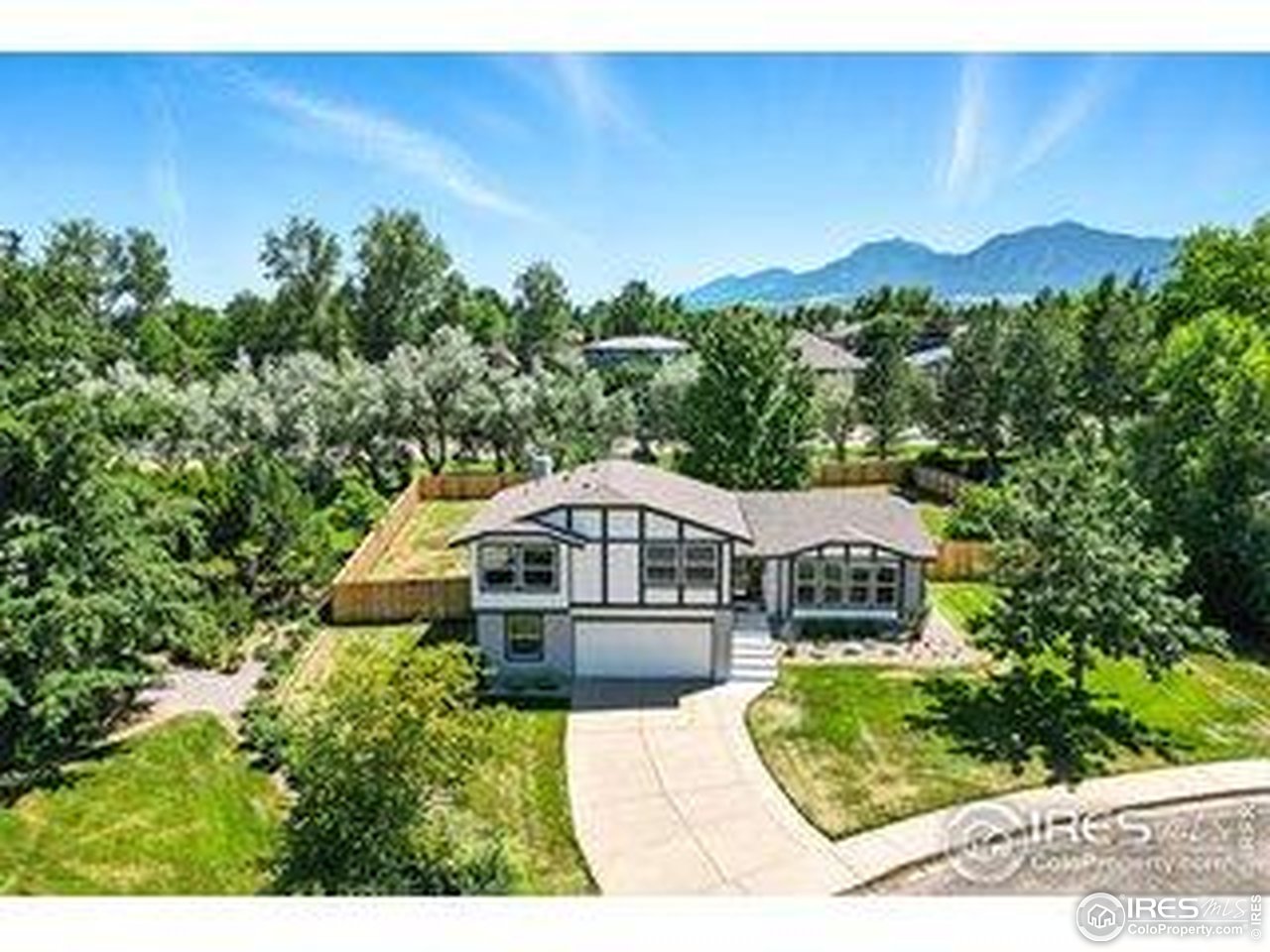 4223 Peach Way Boulder, CO 80301 - Photo 39 of 40 a house with trees in the background