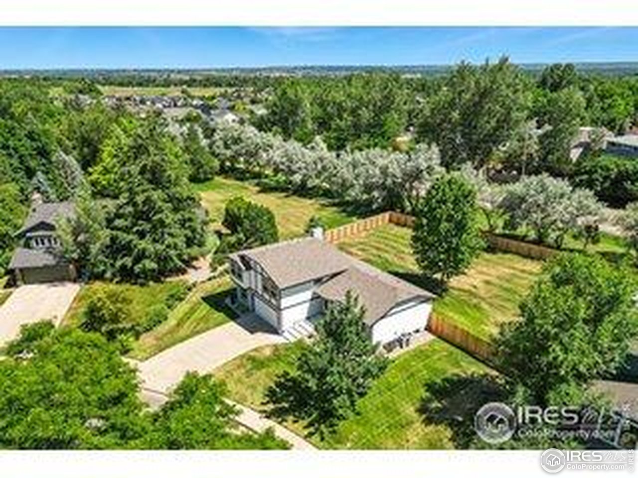 4223 Peach Way Boulder, CO 80301 - Photo 40 of 40 an aerial view of a house with a yard