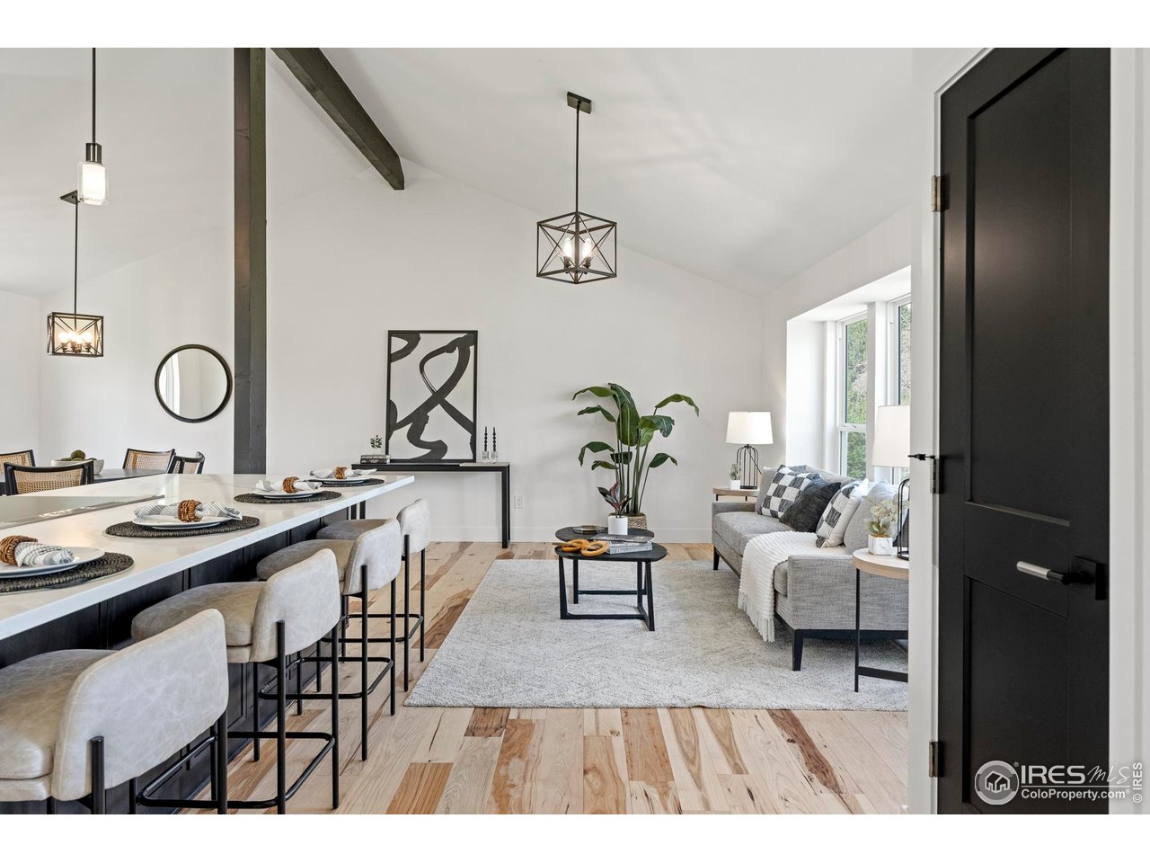 4223 Peach Way Boulder, CO 80301 - Photo 5 of 40 a living room with furniture and wooden floor
