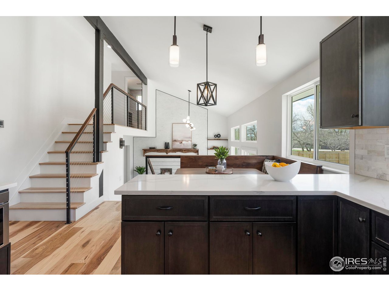 4223 Peach Way Boulder, CO 80301 - Photo 7 of 40 a kitchen with a sink a counter space and a window