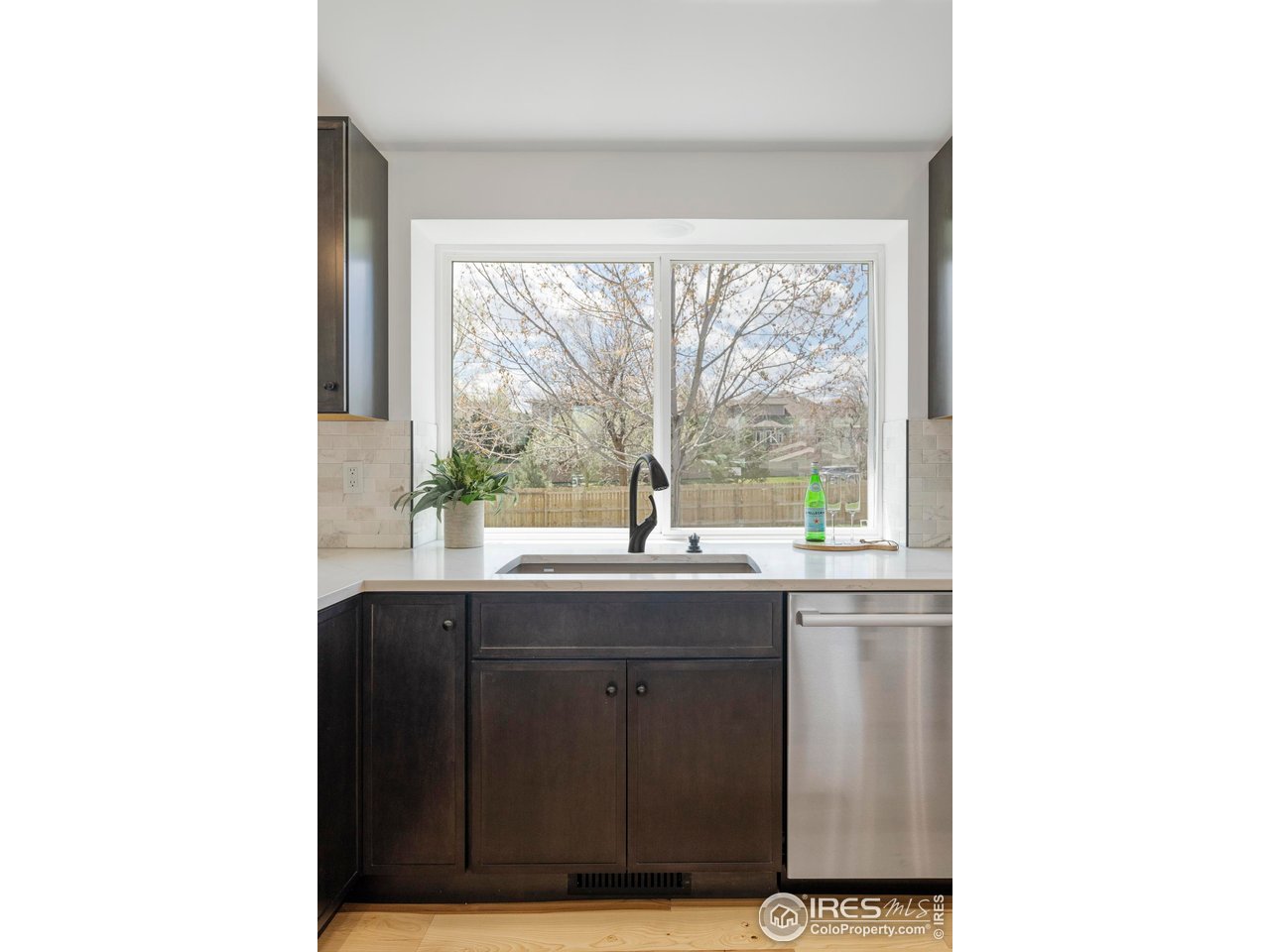 4223 Peach Way Boulder, CO 80301 - Photo 8 of 40 a kitchen with a sink and large window