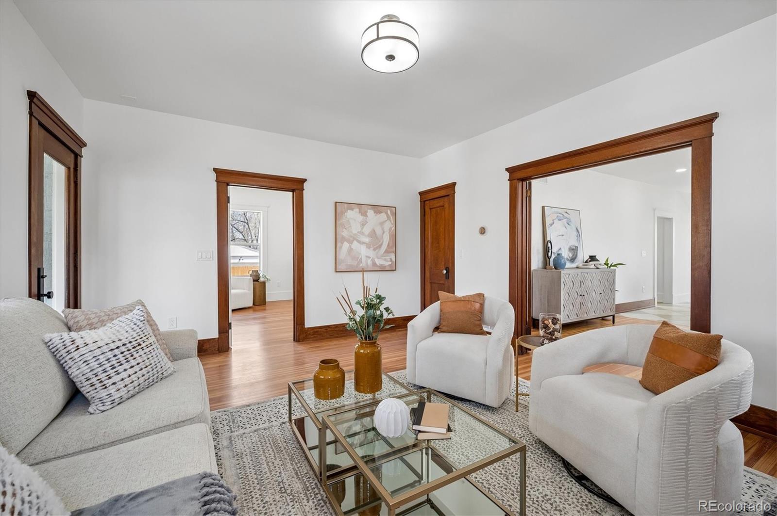 7198 West 29th Avenue Wheat Ridge, CO 80033 - Photo 4 of 49 a living room with furniture