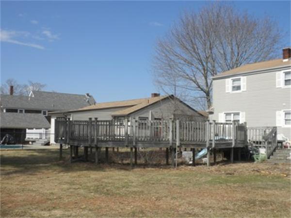 27 Durfee Road Tiverton, RI 02878 - Photo 4 of 7 a view of a house with a balcony