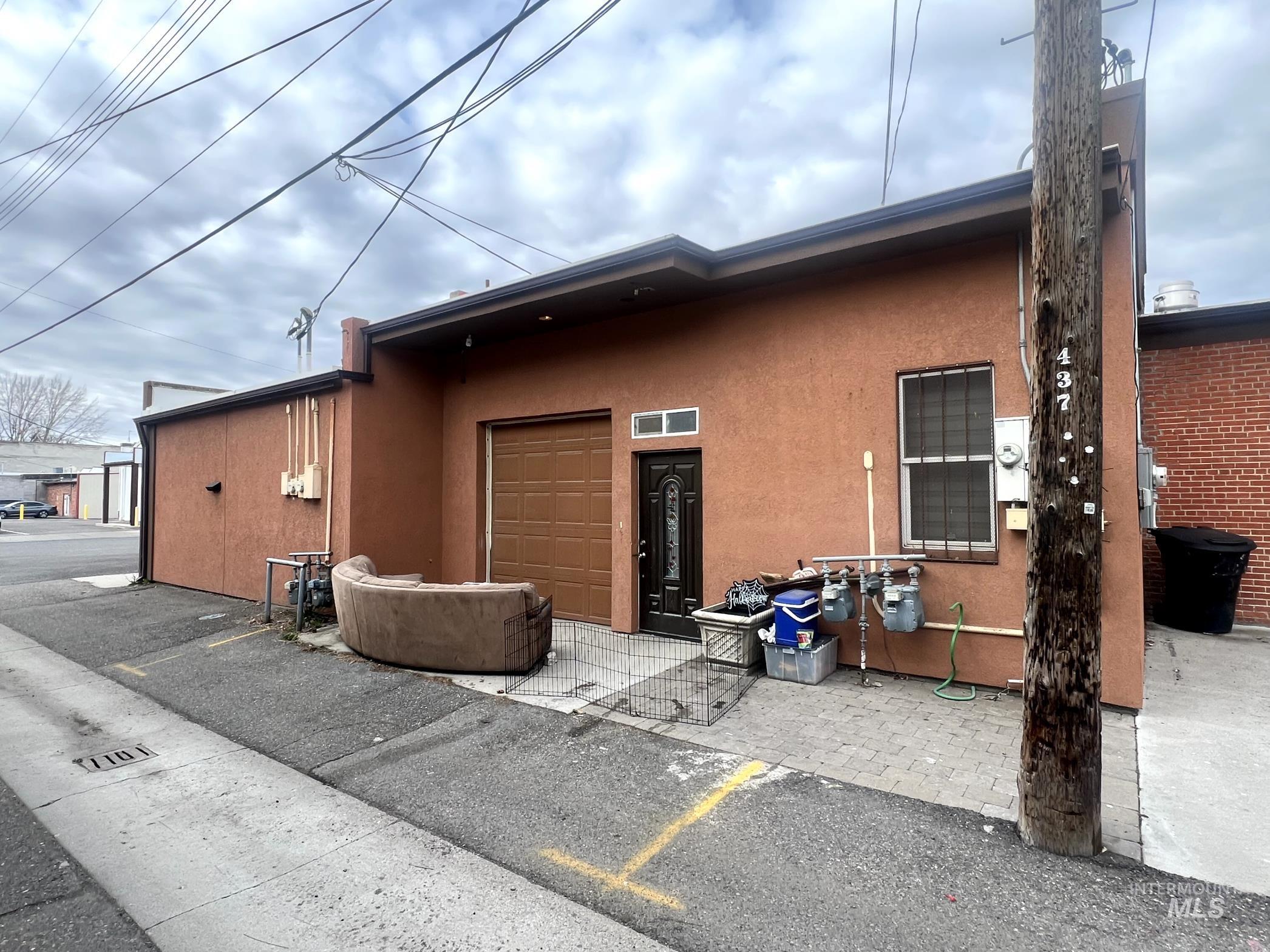 442-446 Main Street Gooding, ID 83330 - Photo 3 of 3 Rear view of house with stucco siding